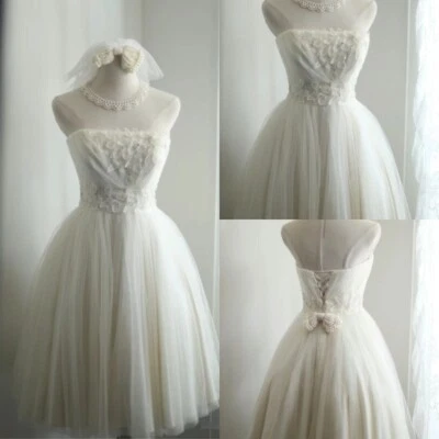 Vestidos de novia cortos sin mangas vintage años 50 60 mini vestidos de novia Foto 1 de 4