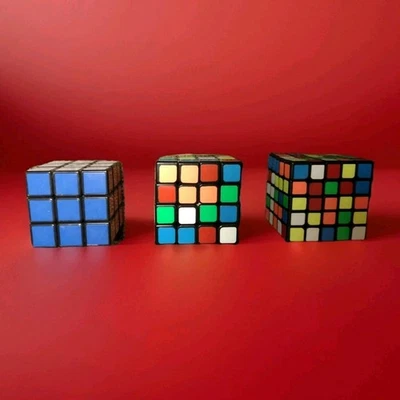 Rubik's 3x3x3 (Solved) & QIYI Cube 4x4x4 And 5x5x5 Puzzle Cube (Unsolved) Used - Image 1 of 4