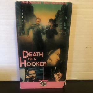 Death of a Hooker - Red Buttons - VHS - Box is torn on bottom - Foto 1 di 2