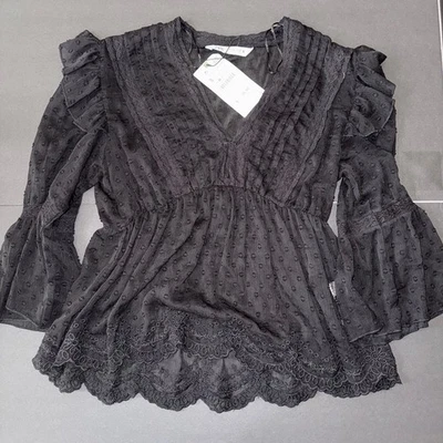 Blusa Zara Swiss Dot con volantes Foto 1 de 4