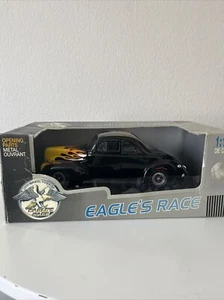 1940 Ford Deluxe Coupe Eagle's Race Universal Hobbies 1:18 Black with Flames - Picture 1 of 1