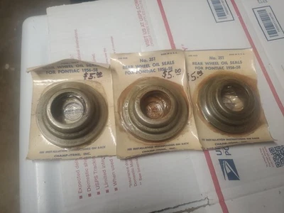 Pontiac 1956-58 rueda trasera sellos de aceite # 351 champ paquete de 2 sellos de aceite NORS Foto 1 de 2
