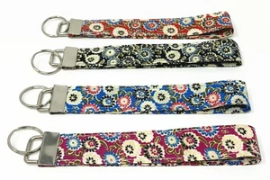 Blumenarmband Schlüsselanhänger Schlüsselanhänger - blau/schwarz/rot/lila - Bild 1 von 10