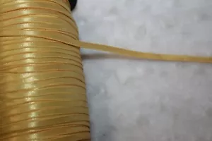 10 yardas PLANO AMARILLO DORADO BRILLANTE DELGADO ELÁSTICO 1/4" ANCHO SATINADO - Imagen 1 de 1