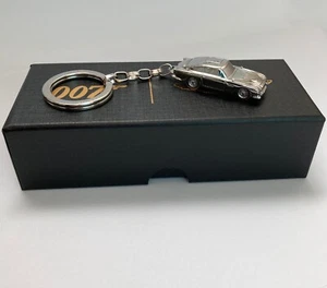 Oficial 007 Aston Martin Wings DB5 Llavero Plateado Llavero James Bond Nuevo En Caja - Imagen 1 de 8