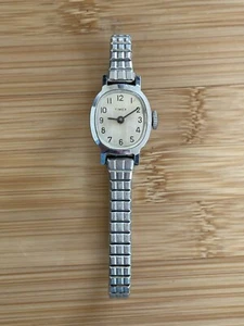 Reloj Timex vintage para mujer correa elástica tono plata - Imagen 1 de 5