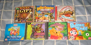 7 CD-ROM SCOOBY-DOO WINNIE THE POOH MR. POTATO HEAD BUBBLE TOWN MONTAGNE RUSSE+ - Foto 1 di 1