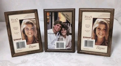 Lote de 3 marcos de fotos de metal acabado de grano de madera para fotos de 3 1/2" X 5" usadas  Foto 1 de 4