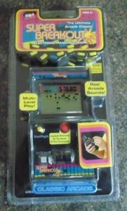 SUPER BREAKOUT ATARI MGA HANDHELD LCD MINI CABINET GAME 2005 NEW OLD STOCK - Picture 1 of 3