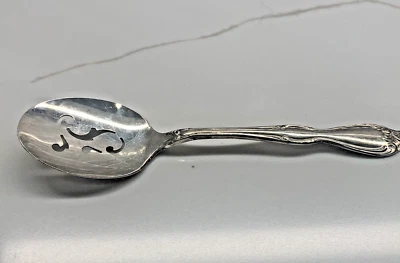 Wm. Rogers A1 Plus. Cuchara para servir Oneida LTD. ranurada plateada Foto 1 de 4