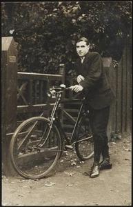 GB. Unused Real Photo Postcard Proud Cyclist with hid Bicycle Undated - Picture 1 of 2