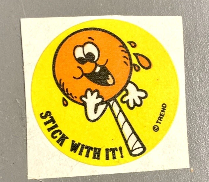 Pegatina vintage mate para rascar y oler de tendencia años 80. Piruleta naranja Foto 1 de 1