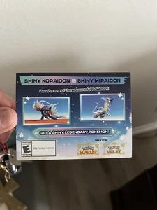 Tarjeta Código Brillante Koraidon O Miraidon Pokemon Escarlata Violeta - Gamestop - Imagen 1 de 4
