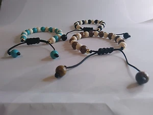 UNISEX NATURAL WOOD, SYNTHETIC TURQUOISE & BLACK STONE BEAD ADJUSTABLE BRACEKLET - Picture 1 of 17