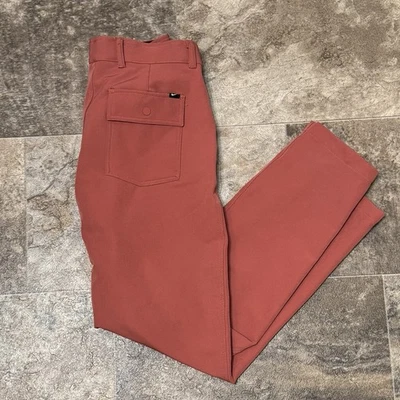 Pantalón de golf Nike Repel utilitario a prueba de lluvia para hombre 34x34 DA2914 salmón coral bolsillos Foto 1 de 4