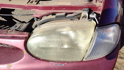 Luz delantera izquierda Ford Aspire 1997 conductor OEM F7bz13008ab Foto 1 de 3