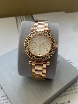 Reloj analógico de cuarzo con pulsera en tono oro rosa Guess Collection X35015L4S para mujer Foto 1 de 3