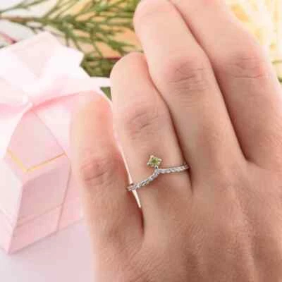 Dainty Chevron Curved 0.26TCW Round Cut Peridot & Simulated Sapphire Woman Ring - Image 1 of 4