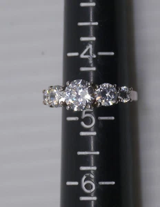 L -- DIAMONIQUE 5-STONE CZ STERLING SILVER RING, SIZE 4.75, PIERCED, CA - Picture 1 of 5