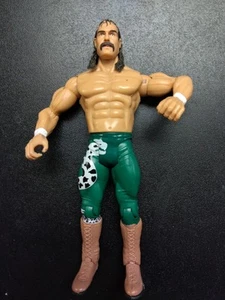 WWF WWE Wrestling Action Figure Jake The Snake Roberts Green 2003 Jakks - Foto 1 di 6