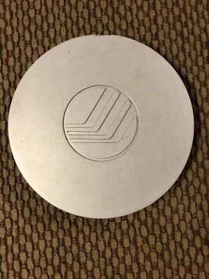 Tapacubos Mercury Tracer 1997-1999 tapa central F7K6-1A096-AB OEM #935 Foto 1 de 2