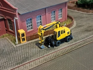 Atlas 1604K Pelle bidirectionnelle passive (voie) véhicules de chantier. Échelle N, 1:160, non peinte - Photo 1/5