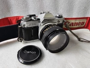 Canon AE-1 35mm Spiegelreflexkamera mit 50mm f/1:1.4 S.S.C Objektiv mit neuem Akku, n. neuwertig. - Bild 1 von 14