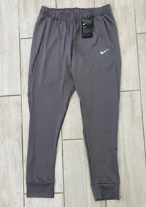 NWT Nike Dri-FIT Men's Tight Fit Jogger Bottoms Pants Dark Gray Size S - XXL - Picture 1 of 8