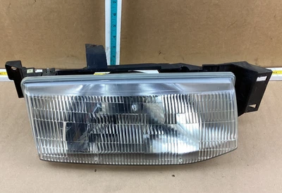 Faro lateral derecho pasajero Ford Escort 1991-1996 114-00192 OEM Foto 1 de 4