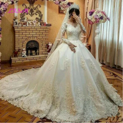 Luxury Ball Gown Wedding Dresses Long Sleeve Lace Appliques Sweep Train Gowns - Image 1 of 4