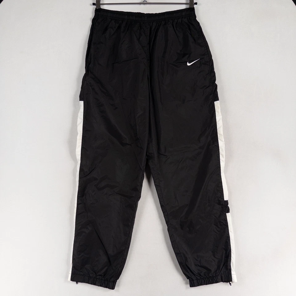 Pantalones de chándal Nike para hombre grandes negros blancos de nailon estilo vintage años 90 puños con cremallera Y2K Foto 1 de 4
