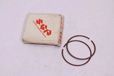 Anillos de pistón Suzuki RM250 1976-1978 NOS OEM 12140-41760 PE250 Foto 1 de 2