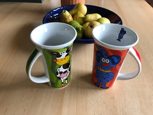 2 x Tassen Tiere bunt gün rot für Kinder - Bild 1 von 4