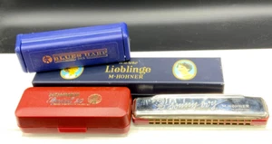 4 unterschiedliche Hohner Mundharmonikas mit Verpackung - Bild 1 von 13