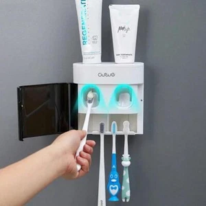 Utomatic Wall-mounted Toothpaste Dispenser & Magnetic Toothbrush Holder – Hands - Picture 1 of 24
