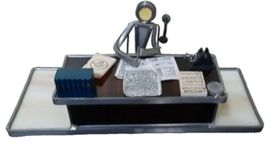Handmade figurine of an editor with corded telephone and documents on the table - Picture 1 of 7