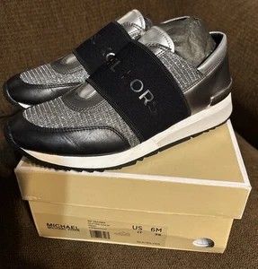 Michael Kors MK Logo Entrenador Tenis Sin Cordones Clásico Jogger Negro Plata 6m - Imagen 1 de 6