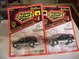 2- chevrolet s10 blazer,road champs,truck series,1:43,opening doors and tailgate - Picture 1 of 4