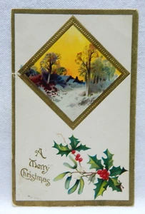 A MERRY CHRISTMAS HOLLY SNOWY COUNTRY PATH EMBOSSED 1900's - Picture 1 of 2