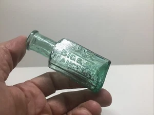 Small Antique Bigg & Co. Trademark Leather Cement Bottle. - Picture 1 of 5