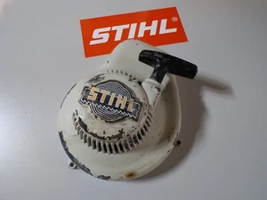 STIHL MS 08- 10S AV OSŁONA ROZRUSZNIKA TYLNEGO. 1108 084 2000 # 1529 - Zdjęcie 1 z 2