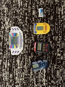 Vintage Handheld Games Lot-Connect 4, Tic Tac Toe, Wheel Of Fortune, Yahtzee - Picture 1 of 1