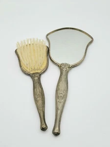 Antiguo cepillo de tocador y espejo plateado diseño floral - Imagen 1 de 8