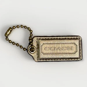 COACH Leather Hang Tag Purse Handbag Charm Fob Metllic Gold 2.25x1 in. - Picture 1 of 8