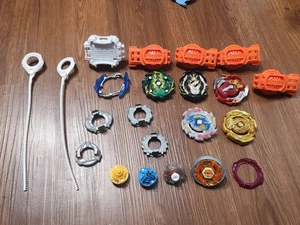 Lot Of Metal And Plastic Beyblades, Burst Spinners, Pieces, Launchers - Bild 1 von 8