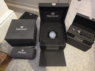 TAG HEUER Connected Modular 45 with boxes comes with rubber and titanium straps  - Image 1 of 4