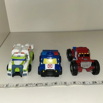 3 bots de rescate Playskool Heroes Transformer-Optimus Prime y otros Foto 1 de 4