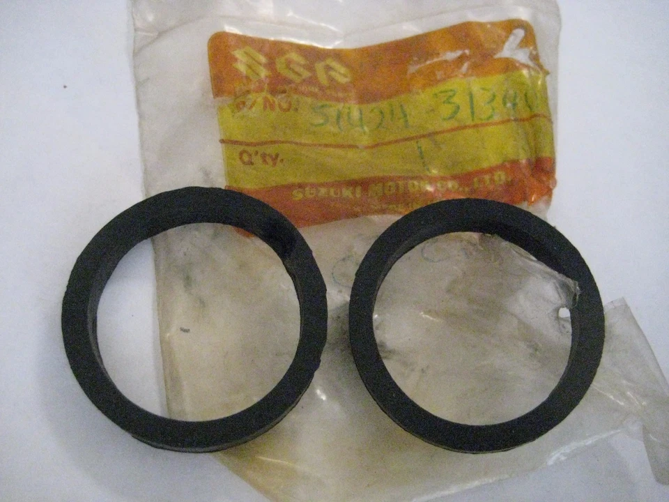 JUEGO DE TAPONES DE ANILLO DE HORQUILLA SUZUKI GS750 ES ¡NOS! Foto 1 de 1