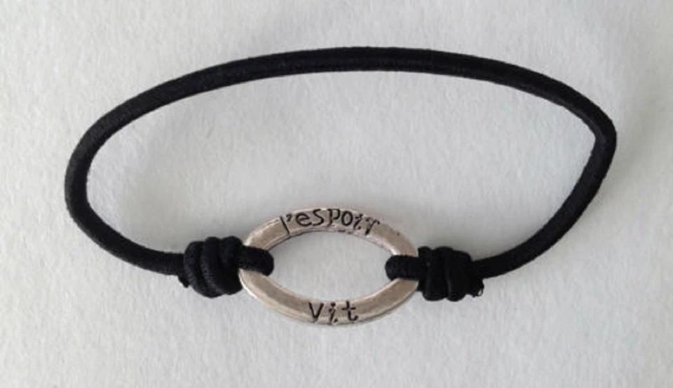 Bijou fantaisie idée cadeau bracelet message noir  "l'espoir vit dans ton coeur" - Photo 1/1