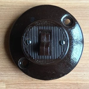 OLD VTG ANTIQUE PORCELAIN BAKELITE LEBITON LIGHT SWITCH BROWN ROUND FRAME MOUNT - Picture 1 of 10